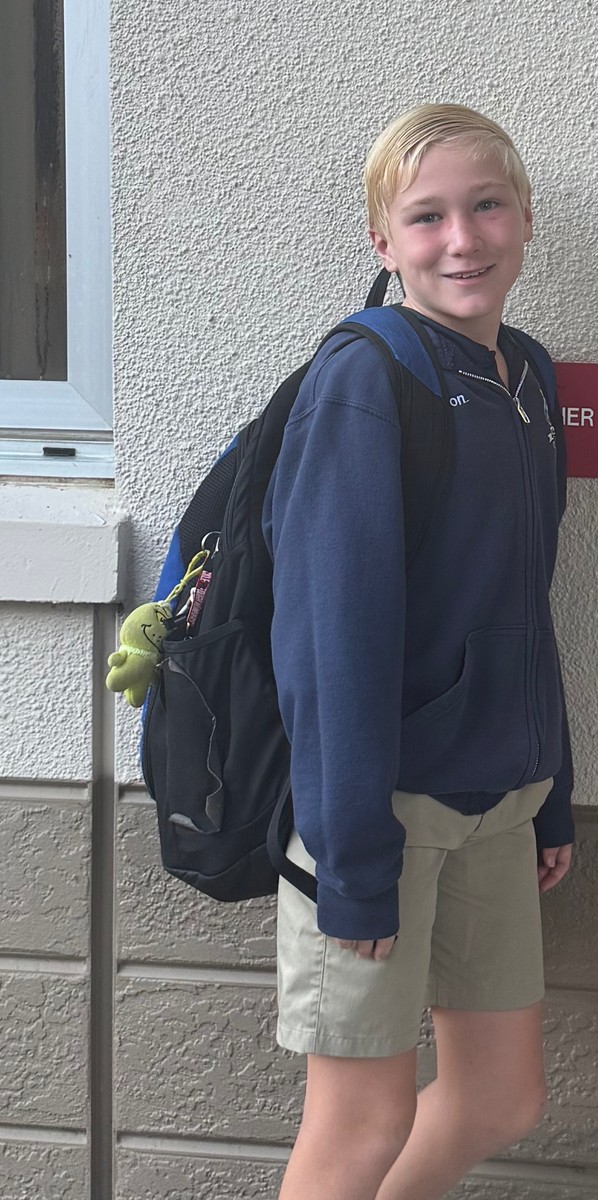Student with backpack ready for school