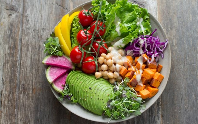 Colorful healthy bowl with vegetables and protein
